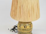 an image of a lamp with a wooden shade on it