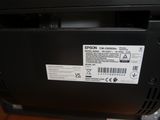 a label on the back of a printer that says epson
