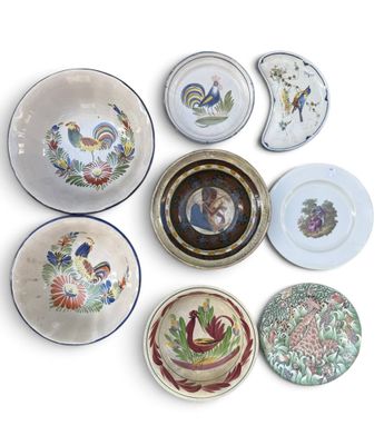 many plates with different designs on them on a white surface