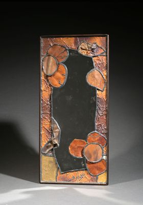 a picture of a picture of a mirror with leaves on it