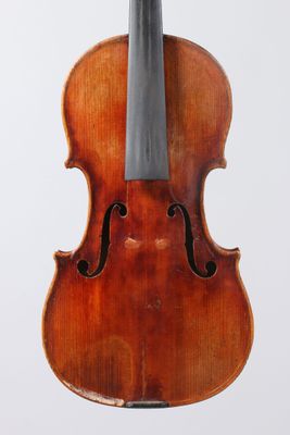 an old violin with a bow on a white background