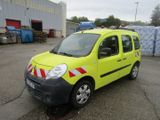 une camionnette jaune garée dans un parking