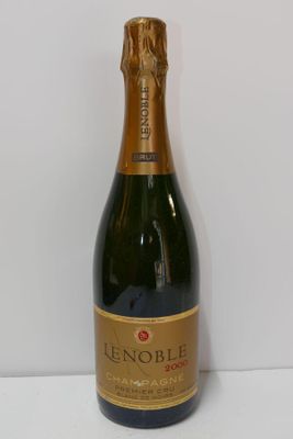 a close up of a bottle of wine on a table