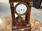 a clock that is sitting on top of a table