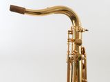 a gold saxophone on a white background with a white background
