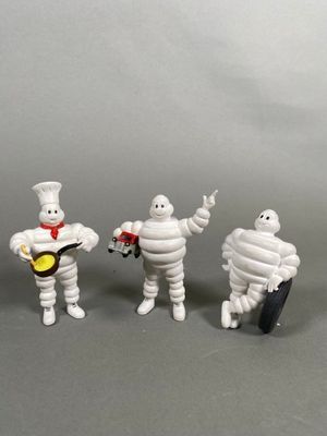 three toy figurines of a chef, cook, and a chef