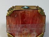 a picture of a box with a stone inside of it