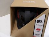 a box with a helmet inside of it on a table