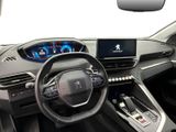 the interior of a car with a steering wheel, dashboard, and display screen