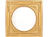 an antique gold frame with a white background