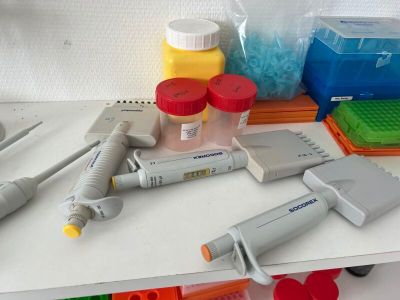 a white table with a bunch of different tools on it