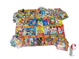 a pile of comic books on a white background