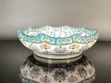 a bowl that is sitting on a black table