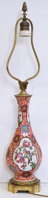 a lamp that is on a table with a lamp on it