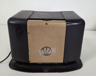 a black and tan box with a brown label on it