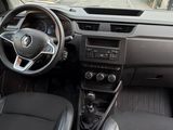 the interior of a small car with a steering wheel and dashboard