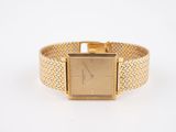 an image of a gold watch on a white background