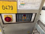 an image of a gas station with a sign on it