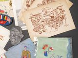 many different types of postcards on the table