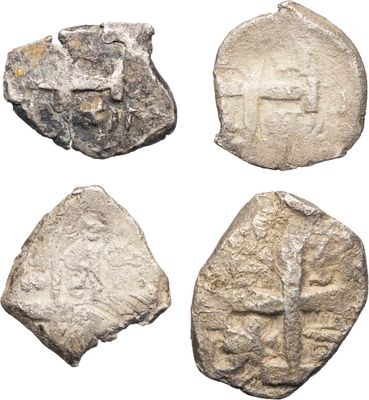 quatre types de roches différents sur fond blanc