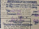 a close up of a document with purple ink on it
