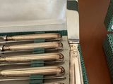 a box of silverware that is sitting on a table