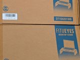 three boxes of computer equipment are stacked on top of each other