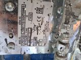a close up of a machine with a metal plate on it