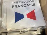 a sign that says fabrication francaisee on it in a box