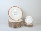 many plates stacked on top of each other on a table