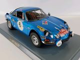 a model of a blue race car on display