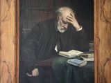 tableau représentant un homme assis à une table, un livre à la main
