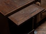 a wooden table with a drawer underneath it on a hard wood floor