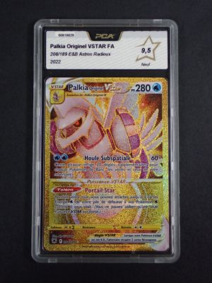 a close up of a pokemon card on a black surface