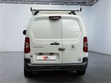 a white van that is parked in a room