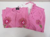 pair of pink pants with pink flowers on them on a white table