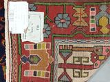a close up of a rug with a tag on it