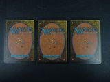 three decks of magic the gathering deck are shown on a table