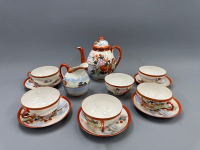 une image représentant un service à thé composé de six tasses et soucoupes