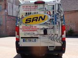a van that is parked in a parking lot
