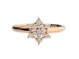 a close up of a diamond ring on a white background