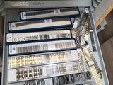 a drawer full of watches and other items in it