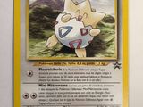 a close up of a pokemon card on a table