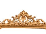 a gold frame that has a picture of a man in it