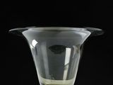 a glass vase that is sitting on a table