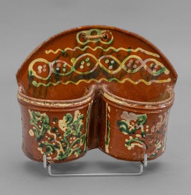 an image of a decorative piece of art on a stand
