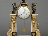 a clock that is sitting on top of a table