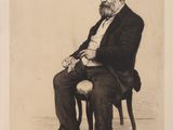 portrait d'un homme en costume assis sur une chaise