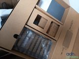 a cardboard box that has a bunch of items inside of it