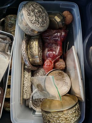 a plastic container filled with assorted items in it